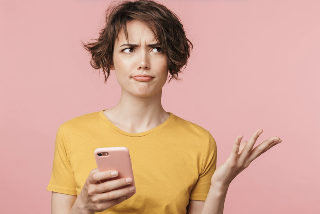 Customer comparing mismatched brand visuals on different screens