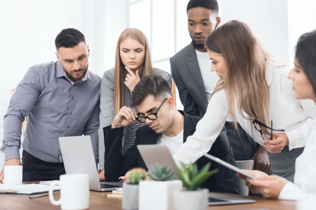 Team analyzing digital analytics for engagement patterns